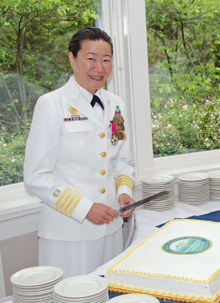 CAPT Ann Minami, JAGC, USN, at her 2014 change of command (courtesy of Ann K. Minami)