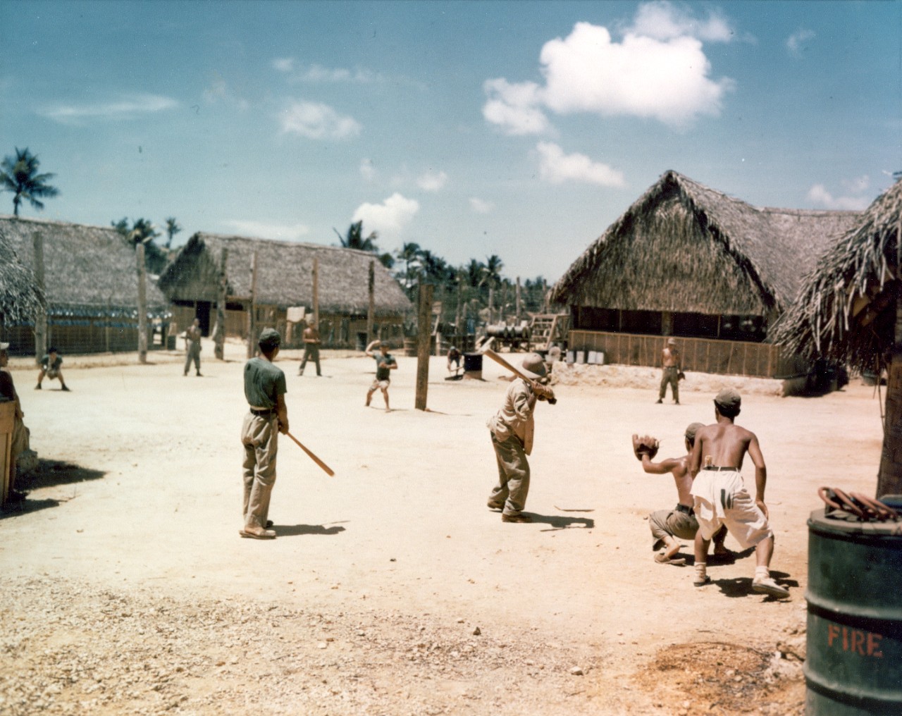 Japanese POWs playing baseball at a Guam POW stockade, 1945.