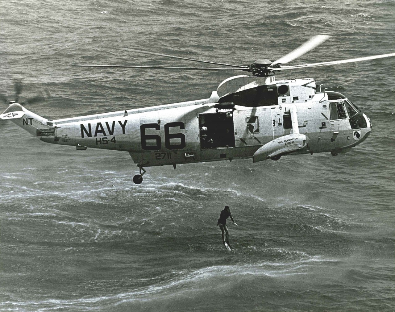 <p>A helicopter drops a UDT swimmer into the water during Apollo 11 recovery practice&nbsp;exercises.&nbsp;</p>

