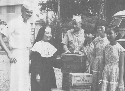 Image of Coast Guard Personnel Distribute Civic Action Material at Saigon School for Blind Girls