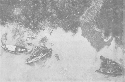 Image of Trawler after destruction with Coastal Group 41 junk alongside
