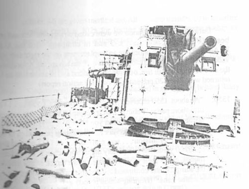 Gunfire support leaves the deck of Hobson (DD 464) littered with 5-inch cartridge cases.