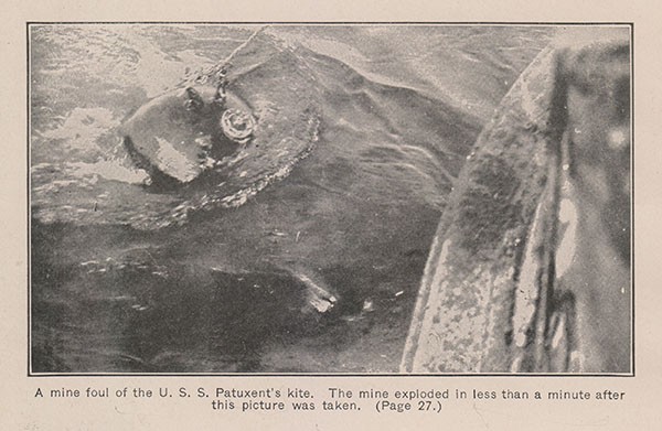 A mine foul of the U. S. S. Patuxent’s kite. The mine exploded in less than a minute after this picture was taken. (Page 27.)