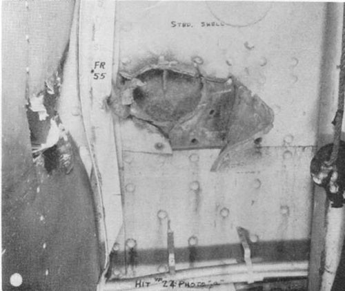 Photo 28: Hit No. 24 (6") showing hole through two thicknesses of 35 lb. S.T.S.