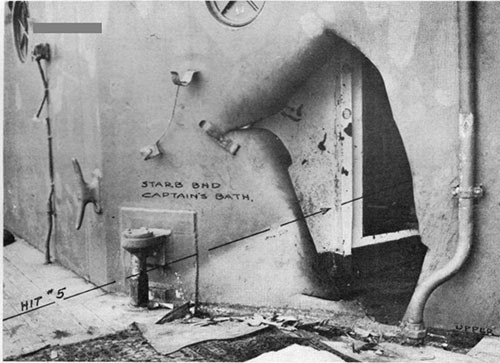 Photo 10; Hit No. 5 showing point of entry of 14" shell into Captain's bath.
