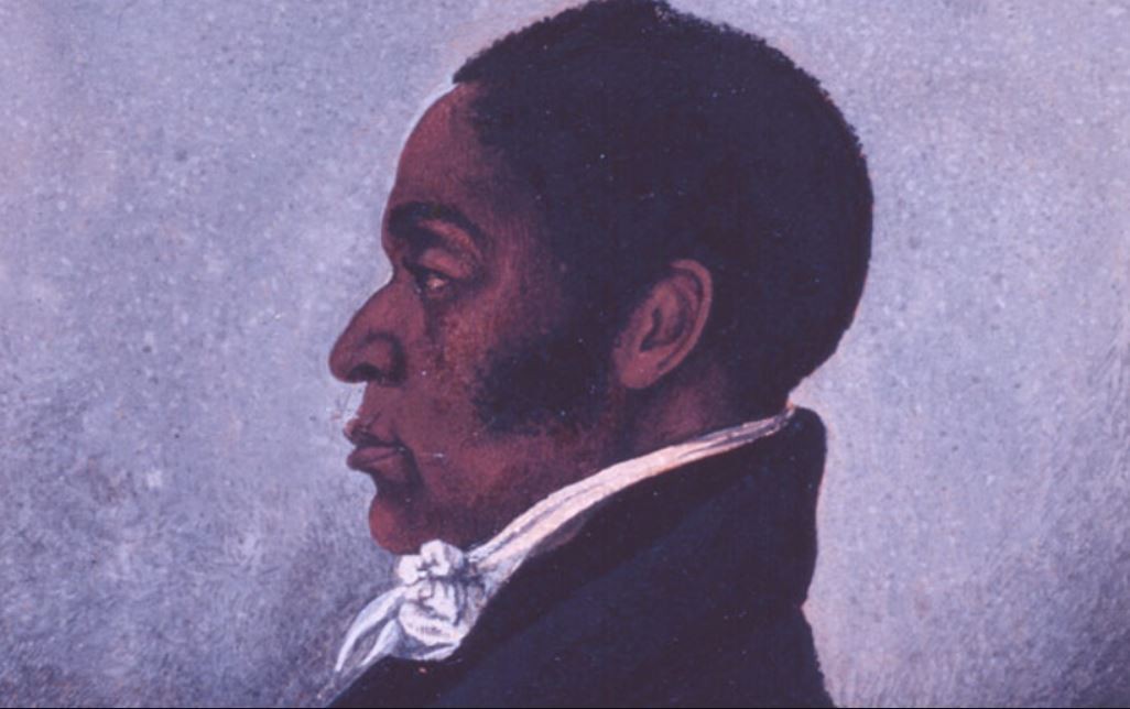 side-view image of man with ascot