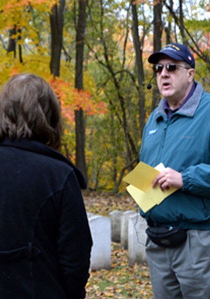 NMAS volunteer leading a NSGL cemetery tour.
