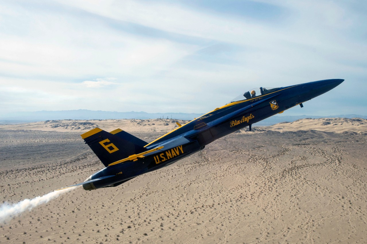 160116-N-NI474-043:   Blue Angels Maneuver:  Section High Alpha Pass.   F/A-18 Hornet, January 2016.  U.S. Navy Flight Demonstration Squadron, the Blue Angels, Opposing Solo Capt. Jeff Kuss practices the Section High Alpha Pass maneuver during a training flight over El Centro, California, January 16, 2016. Blue Angels pilots will complete 120 practice flights before kicking off the 2016 air show season when the team will celebrate its 70th anniversary.  Photographed by Mass Communication Specialist 2nd Class Daniel M. Young.  Official U.S. Navy Photograph.  