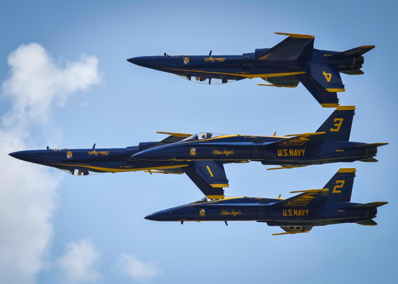 170423-N-KE519-042:   Blue Angels Maneuver:  Double Farvel.   F/A-18 Hornet Aircraft, April 2017.  The U.S. Navy flight demonstration team, the Blue Angels, fly in formation over Naval Air Station Joint Reserve Base (NAS JRB) during the New Orleans Air Show, April 22, 2017. NAS JRB New Orleans hosted its first air show since 2011.   Photographed by Mass Communication Specialist 2nd Class Edward Guttierrez III.  Official U.S. Navy Photograph.   