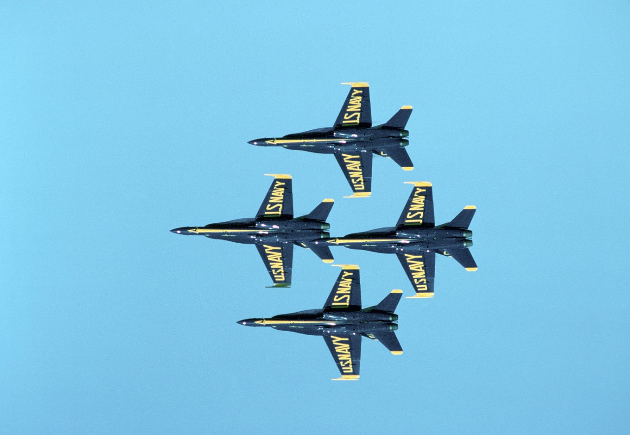 330-CFD-DN-ST-89-06471:  Blue Angels Maneuver:  Diamond Formation.  F/A-18 Hornet, November 1987.    Four F/A-18 Hornet aircraft fly in a tight diamond formation, November 1, 1987.   Photographed PH2 Rodridquez.  Official U.S. Navy Photograph, now in the collection of the National Archives. 