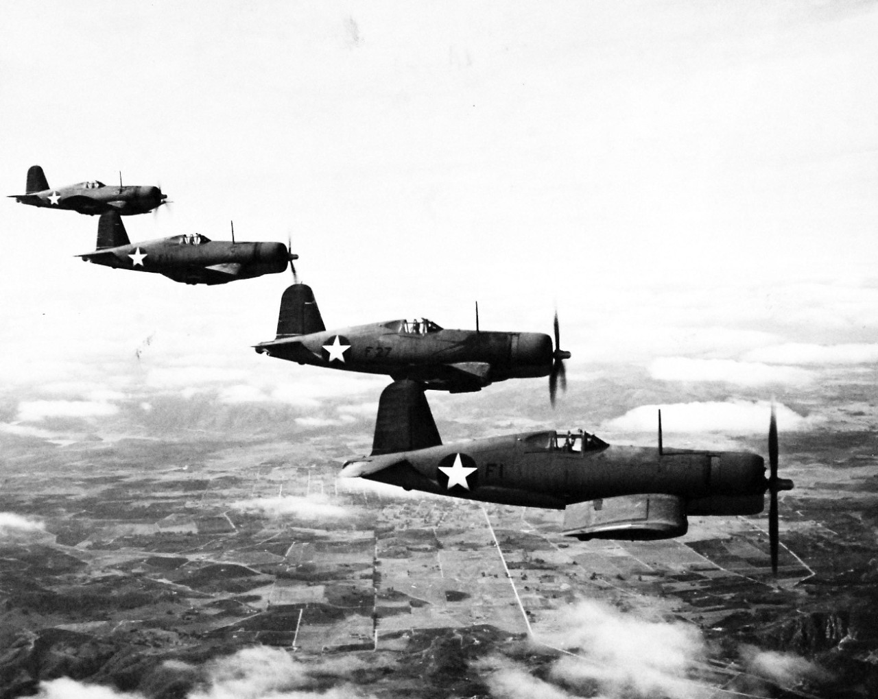 80-G-40930:  Vought F4U Corsair, March 1943.  Formation of F4U-1 planes, March 23, 1943.   Steichen Photograph Unit, photograph released, TR 2727, March 23, 1943.   Official U.S. Navy Photograph, now in the collections of the National Archives.  