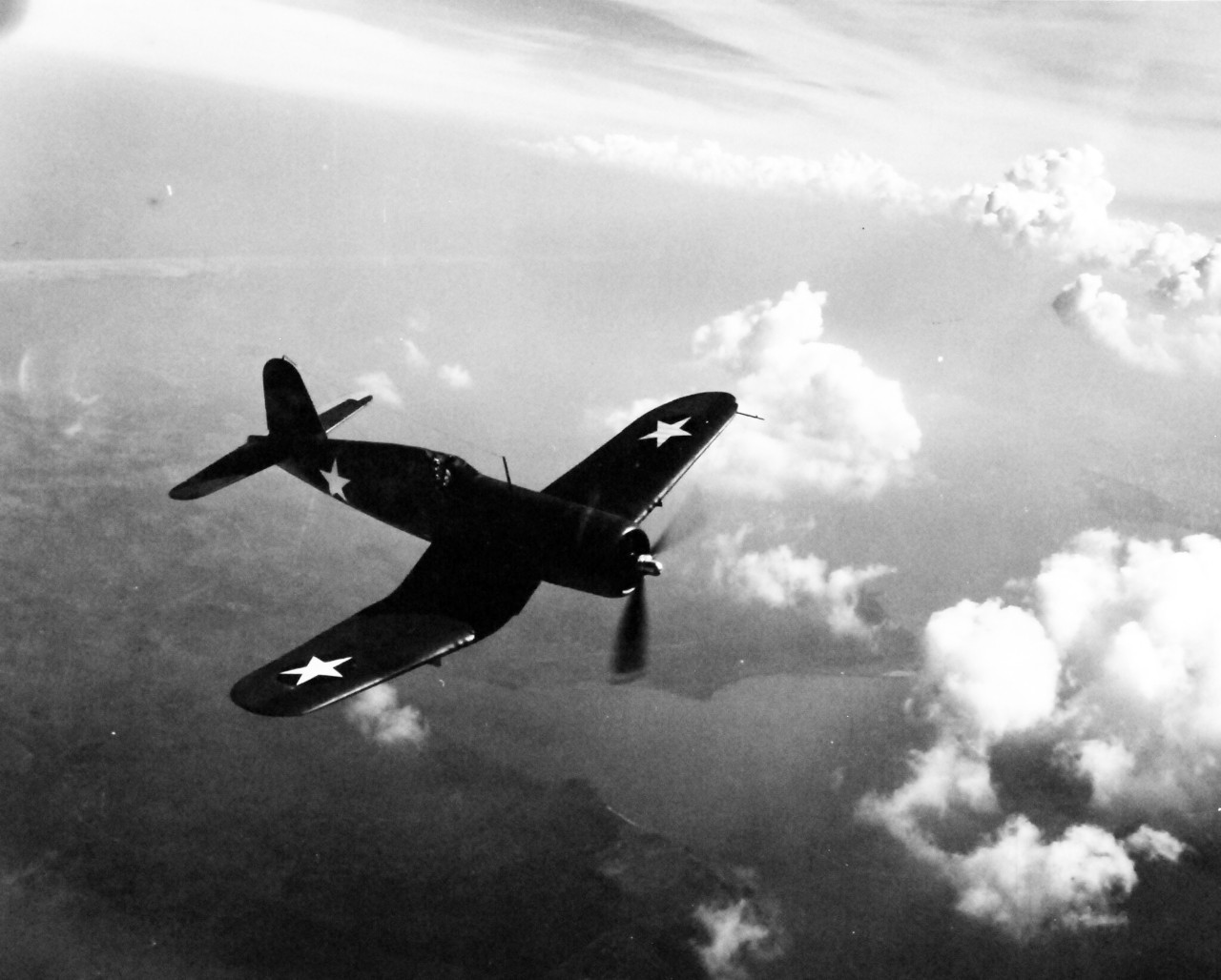 80-G-425088:  Vought F4U Corsair, July 1942.   Corsair in flight over Norfolk, Virginia, July 1942.  Official U.S. Navy Photograph, now in the collections of the National Archives.  