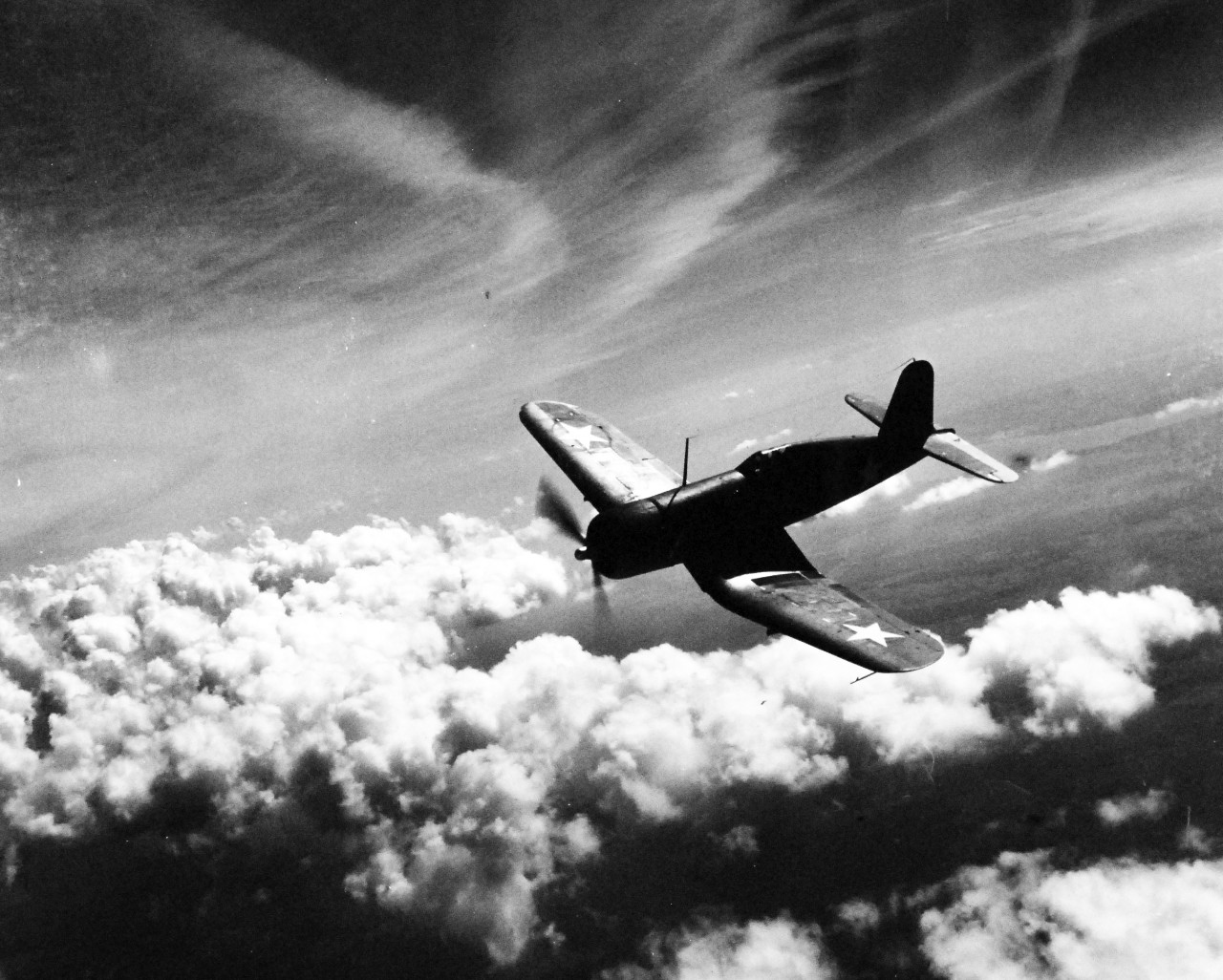 80-G-425103:  Vought F4U Corsair, September 1942.   Corsair in flight over Norfolk, Virginia, September 1942.  Official U.S. Navy Photograph, now in the collections of the National Archives.  