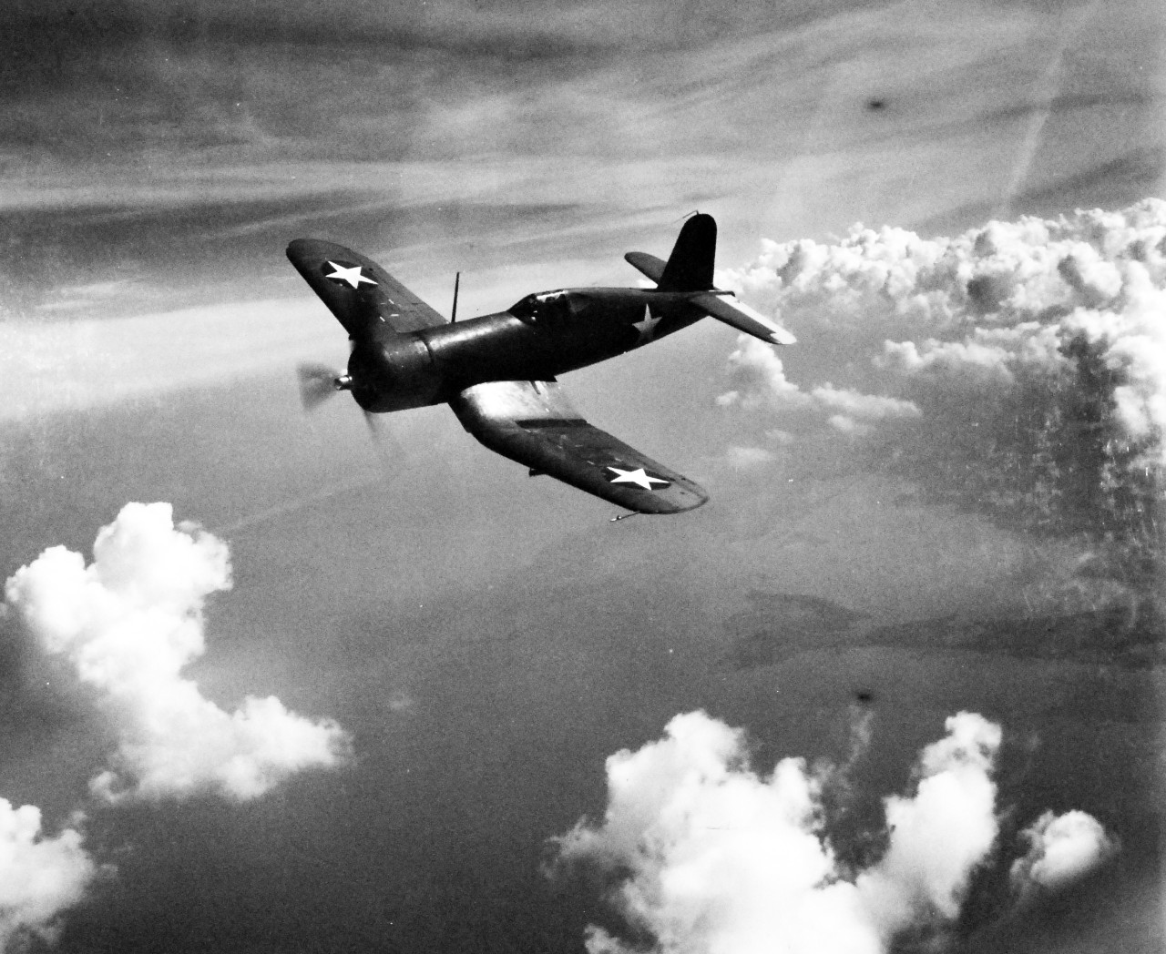 80-G-425106:  Vought F4U Corsair, September 1942.   Corsair in flight over Norfolk, Virginia, September 1942.  Official U.S. Navy Photograph, now in the collections of the National Archives.  