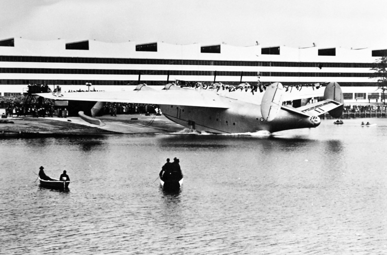 LC-Lot-9827-7: Martin JRM “Mars” aircraft, XPB2M-1, 1941. The giant is shown hitting the water during the christening ceremony held on November 8, 1941. Album from The Glenn L. Martin Company, Baltimore, Maryland, 1941. Courtesy of the Library of Congress.  