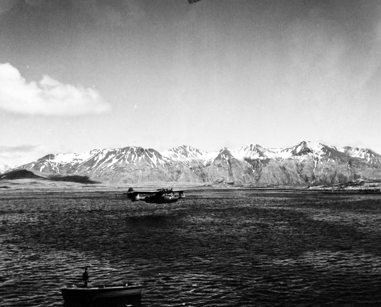 80-G-475734:   PBY-5 “Catalina” patrol bomber, July 1943.   PBY-5 comes in for landing near seaplane tender in Attu Harbor in Aleutians  Photographed by Lieutenant Horace Bristol, July 1943.  TR-5228.  U.S. Navy photograph, now in the collections of the National Archives.  (2015/11/17).