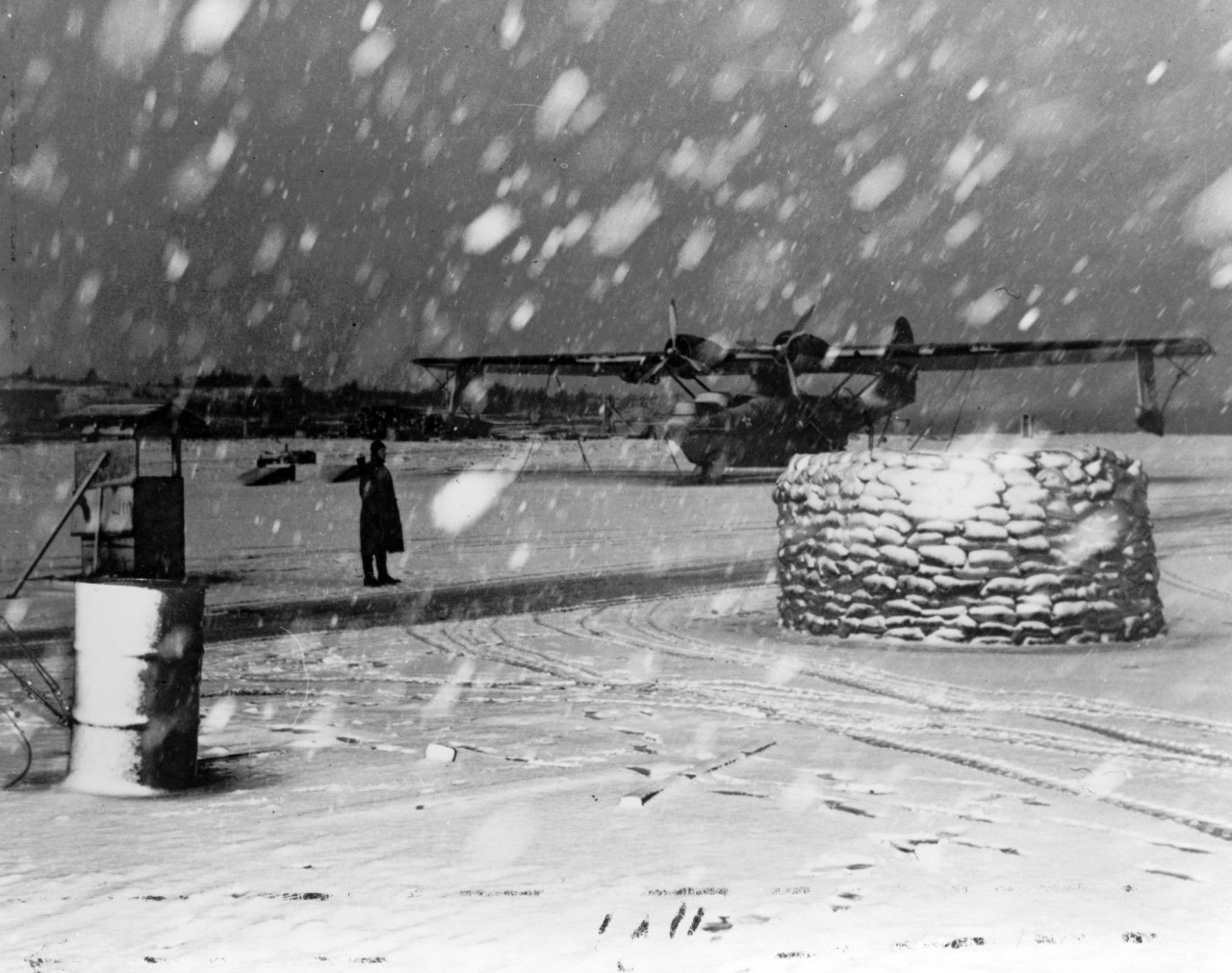 LC-USZ62-105160:  PBY-5 “Catalina” Aircraft, 1942.    Photographed during a snowstorm at Kodiak, Alaska, March 20, 1942.  Official U.S. Navy photograph.  Donated by J. Spagnola.   Photographed through Mylar sleeve. Courtesy of the Library of Congress.  (2015/10/09)