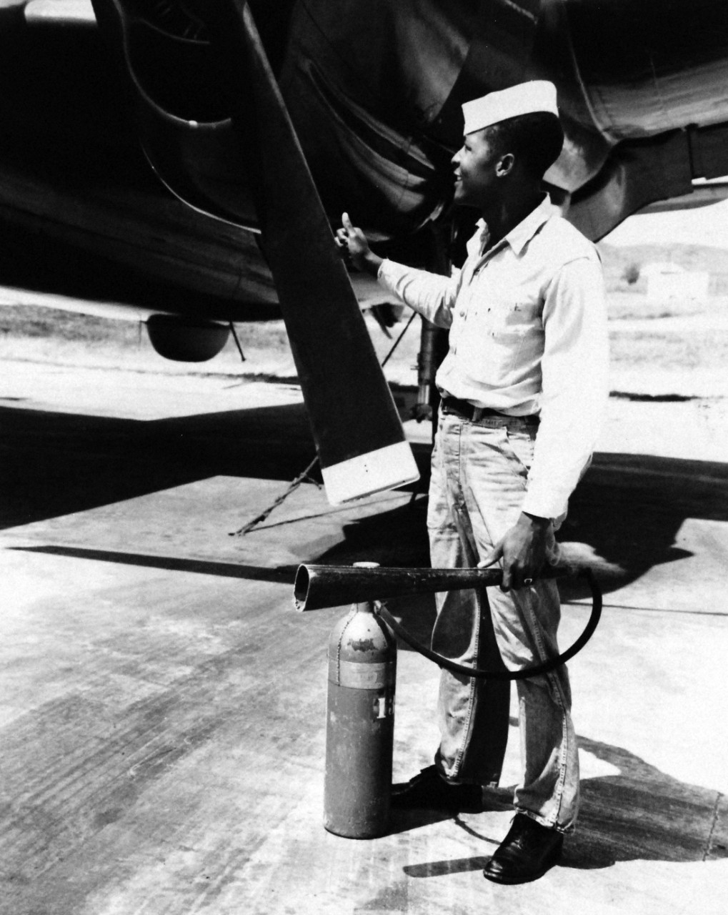 80-G-413553:   U.S. Naval Air Station, Roosevelt Roads, Puerto Rico, August 1949.   RM2 William Moore, who serves as a lineman with VP-5.  Photograph released August 1, 1949.  Official U.S. Navy photograph, now in the collections of the National Archives.  