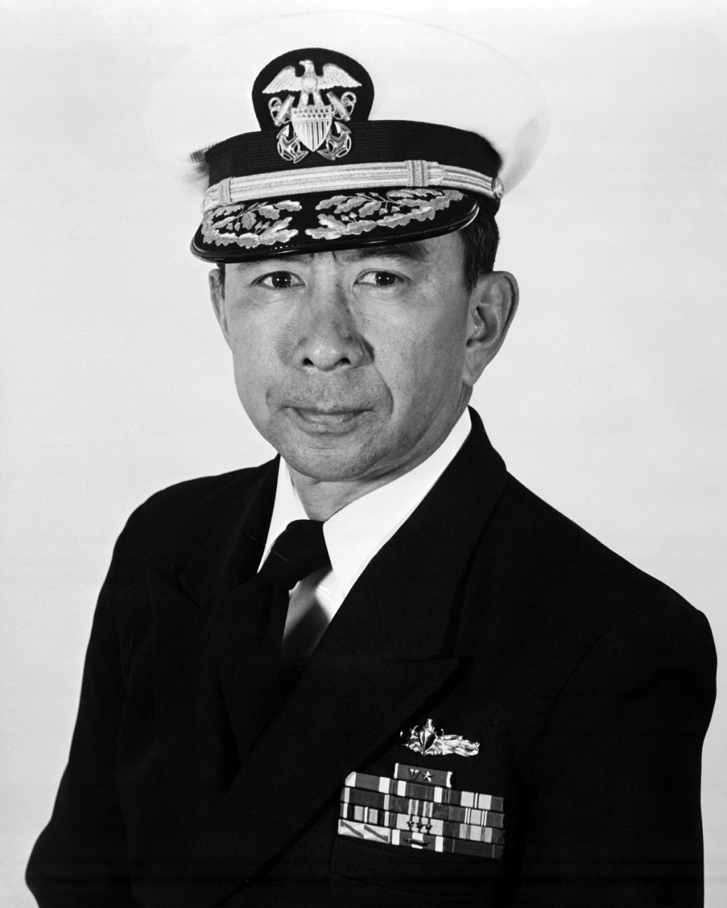 330-CFD-DN-SN-84-10138:   Commodore Robert K. U. Kihune, USN, 1984.   Covered photograph from August 1, 1984.   Official U.S. Navy photograph, now in the collections of the National Archives. 