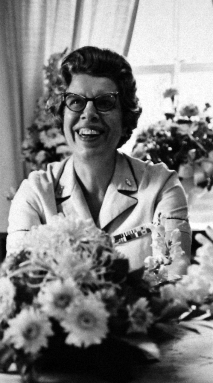 428-GX-USN 1151925:  Rear Admiral Alene B. Duerk, Director of the Navy Nurse Corps, July 1972.   Duerk arranges flowers in her home in Washington, D.C  The new Rear Admiral is the first woman to reach her rank.  Photograph by JOC Byron Whitehead, July 1972.   Official U.S. Navy Photograph, now in the collections of the National Archives.  