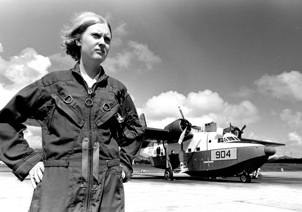 USN 1153932:   Airman Apprentice Christine W. Ballard, October 1972.   Ballard performs maintenance on an MU-160 Albatross utility aircraft at U.S. Naval Station, Roosevelt Roads, Puerto Rico.  Photographed by PHAN Anthony M Page. Official U.S. Navy photograph, now in the collections of the National Archives. 