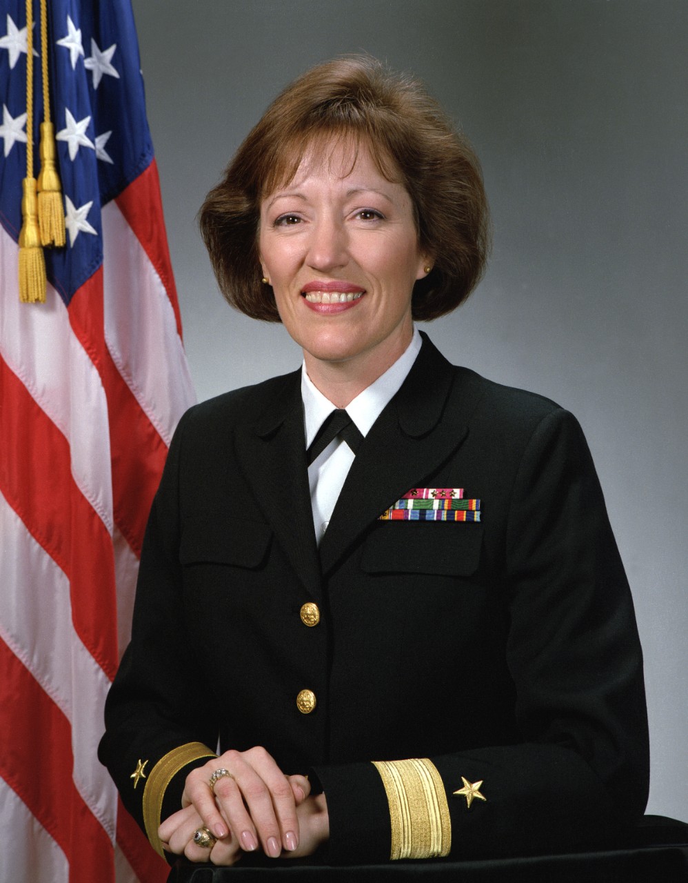 330-CFD-DN-SC-93-04081:   Rear Admiral Marsha J. Evans, 1993.  Captain Marsha J. Evans assumed command of Naval Station, Treasure Island, San Francisco, California, becoming the first woman to command a naval station.   Official U.S. Navy photograph, now in the collections of the National Archives.  