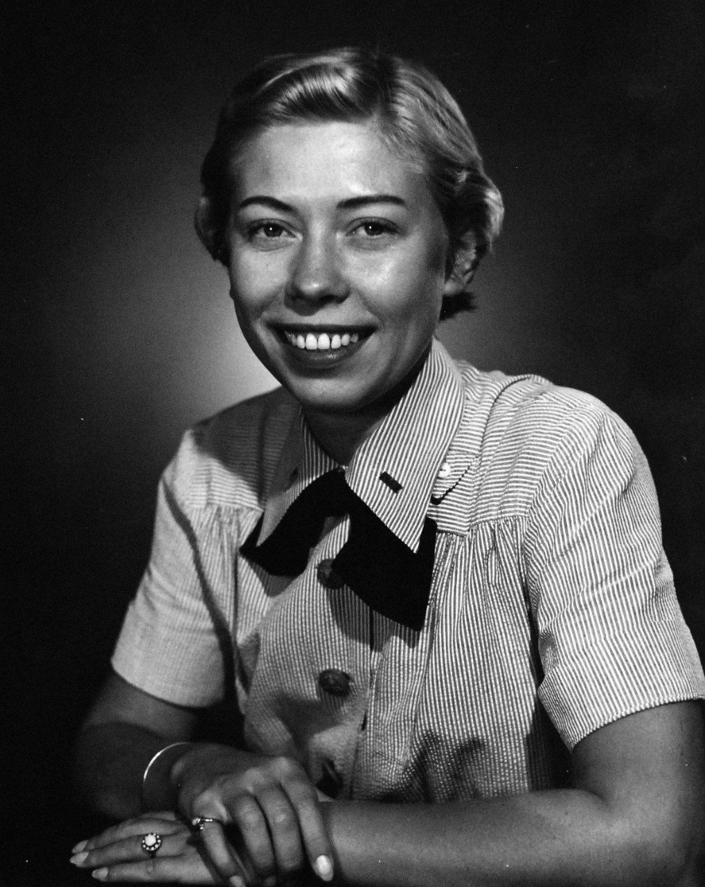 USN 639979:  Lieutenant Junior Grade Eva W. Schekorra, USN, July 1954.  Schekorra was the first U.S. Navy female officer assigned duty to Rome, Italy, July 1954.    Master Caption:   U.S. Navy to Send Woman Officer to Attache Duty in Rome.  The First woman officer assigned to duty in Rome, Italy, by the Navy is Lieutenant Junior Grade Eva W. Schekorra, USN.    She served as communications officer in the office of the Naval Attache.    Schekorra graduated from the College of Saint Teresa in Kansas City in 1947 and served in the active Navy since October 1951.   Her brother also served in the U.S. Navy during this time, Fred W. Schekorra, Jr., and was based out of Japan as a Hospital Corpsman with the Third Marine Division.  Photographed July 20, 1954.  Official U.S. Navy photograph, now in the collections of the National Archives.   