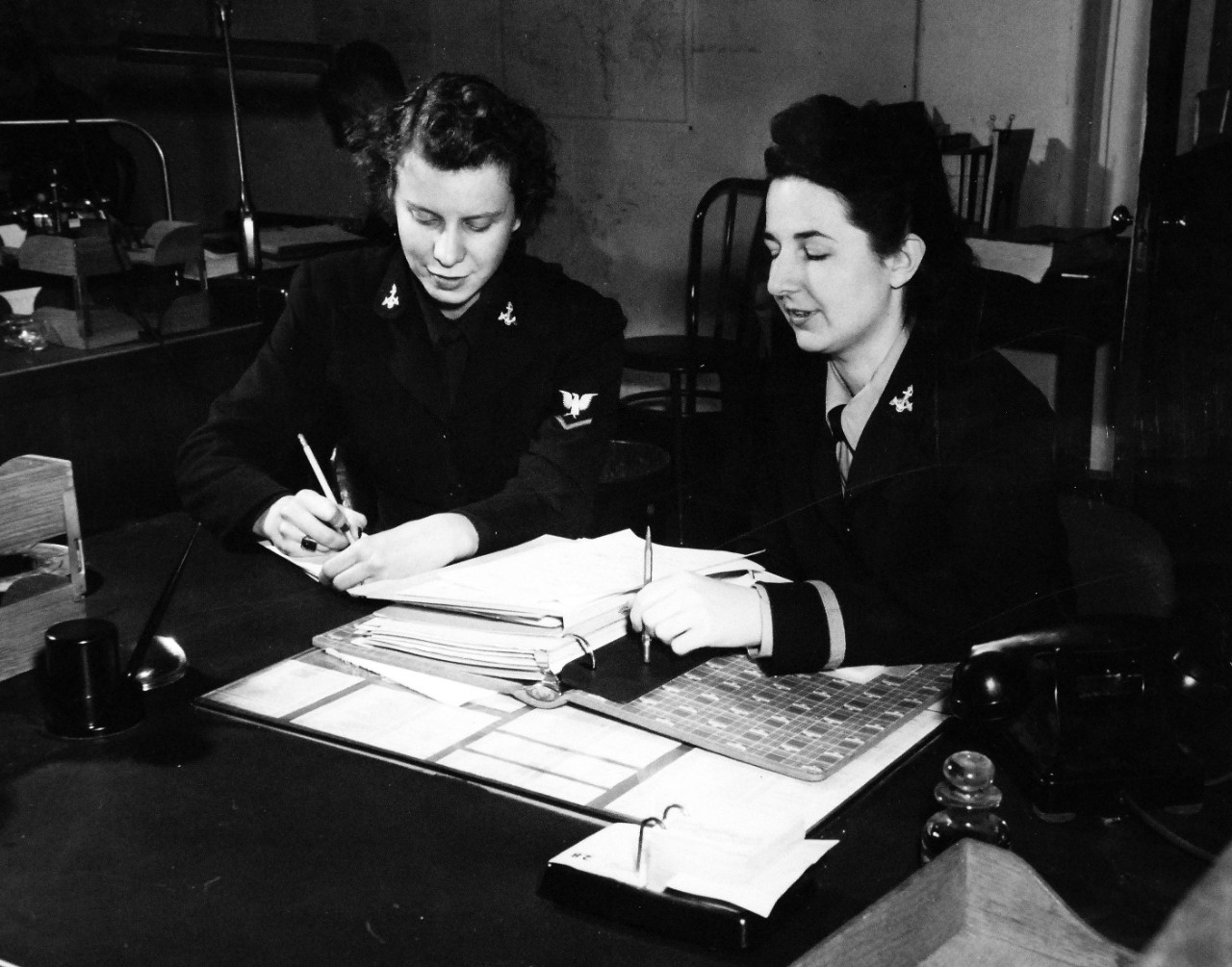 80-G-40220:  WAVES Ensign Mary H. Banker, January 1943.   Banker is dictating letter to YN3 Elizabeth Blum at the Navy Department, Washington, D.C., January 2, 1943.  Official U.S. Navy photograph, now in the collections of the national Archives.  