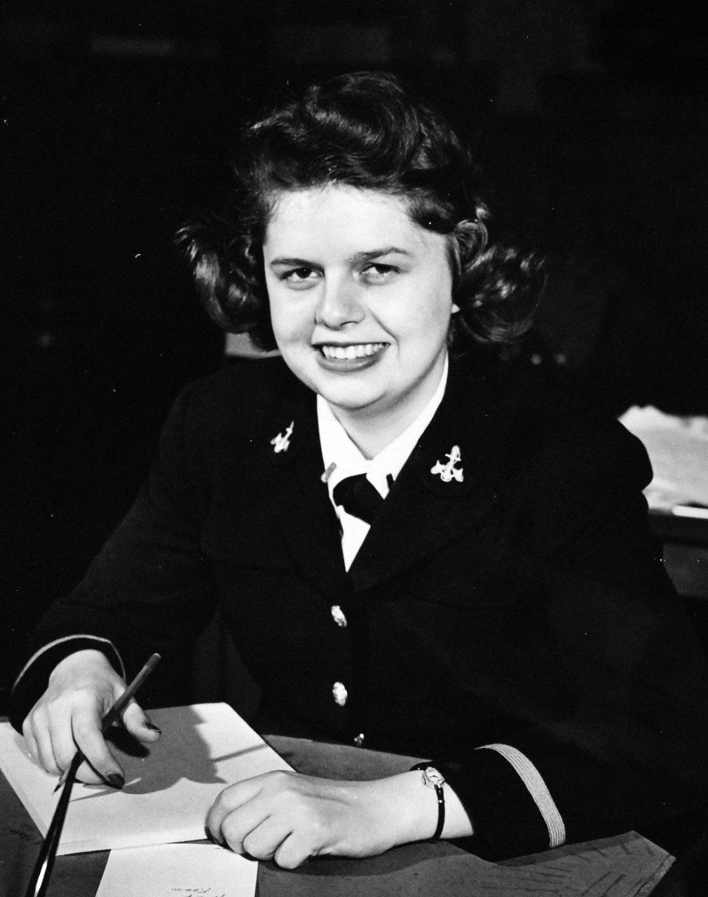 80-G-43519:  Ensign Betty J. Woodson, USNR.  Service Dress Blue Uniform.  Photograph released November 8, 1943.  Official U.S. Navy photograph, now in the collections of the National Archives.  
