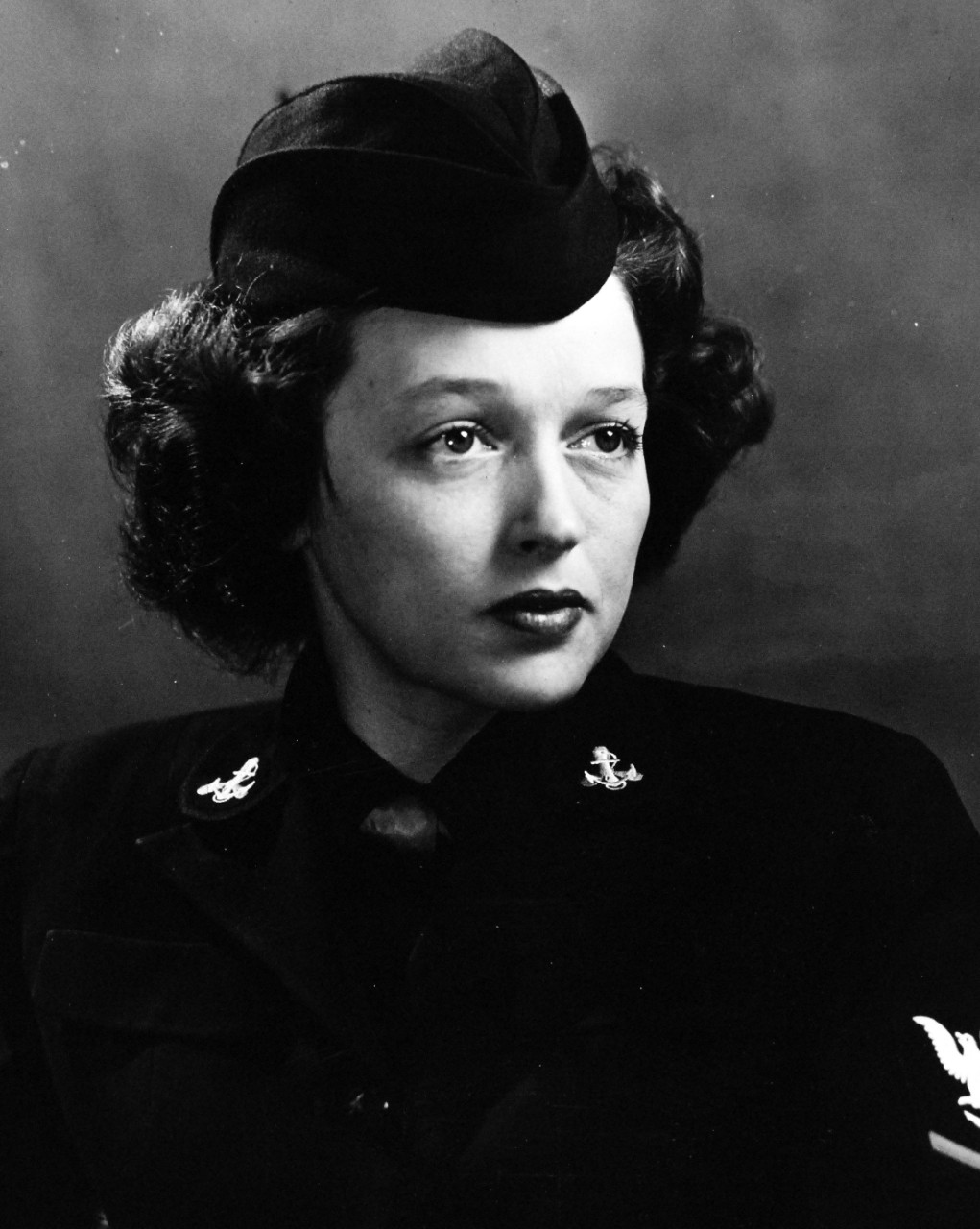 80-G-47174:  Yeoman Third Class Kittye Coleman, December 1944.   Coleman models the specifically designed garrison hat for U.S. Navy officers and enlisted WAVES, December 1, 1944.  Official U.S. Navy photograph, now in the collections of the National Archives.  