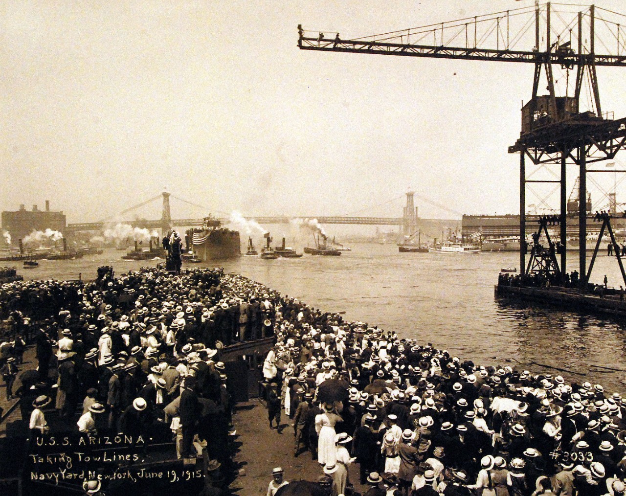 <p>19-LC-19A-25: USS Arizona (BB 39), taking the tow lines during launching at New York Navy Yard, New York City, June 19, 1915.&nbsp;</p>
