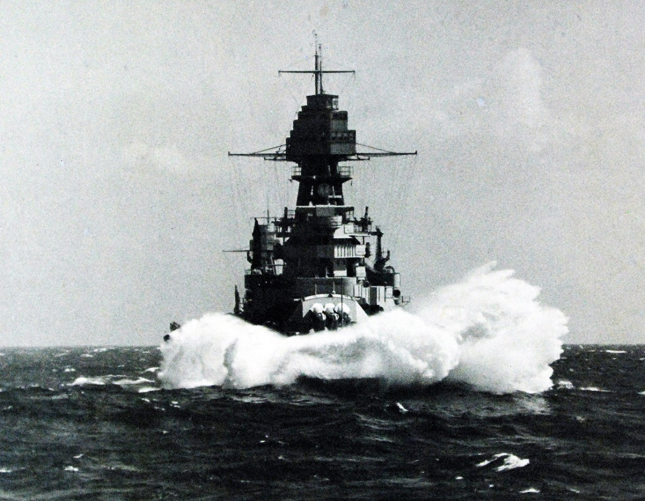 <p>80-G-463104: USS Arizona (BB 39), head on view, while at sea. Photograph received October 1951. (4/14/2015).</p>
