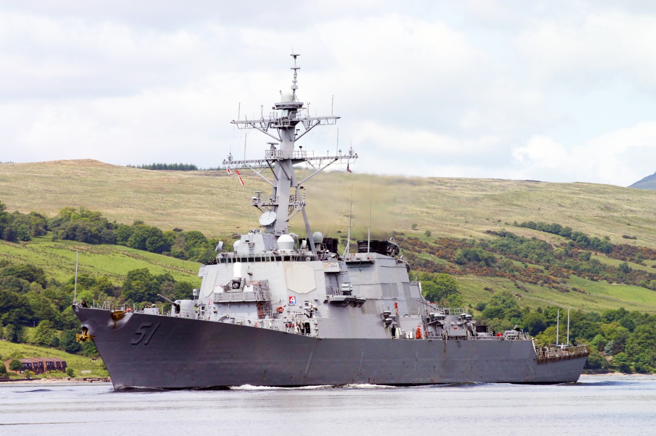 050606-N-0000C-001:   USS Arleigh Burke (DDG-51), 2005.    Guided-missile destroyer departs Clyde Naval Base, Faslane, Scotland, while participating in the Joint Maritime Course, a multinational NATO exercise conducted off the coast of Scotland.   Photograph by Mr. Dave Cullen.   Official U.S. Navy Photograph.   