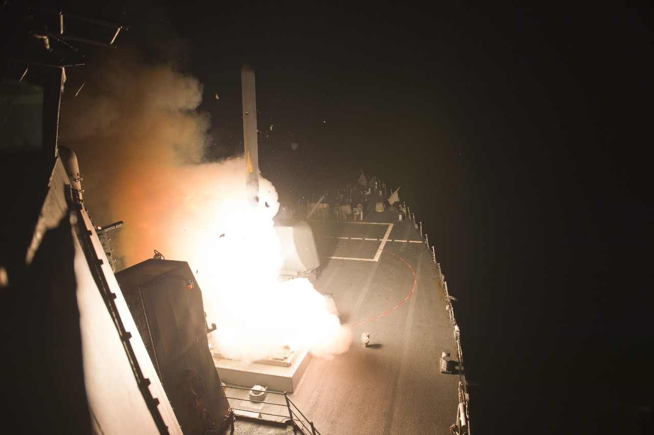 140923-N-WD757-267: USS Arleigh Burke (DDG-51), 2014.   Guided-missile destroyer launches Tomahawk cruise missiles against ISIS in the Red Sea, September 23, 2014. Arleigh Burke is deployed in the U.S. 5th Fleet area of responsibility supporting maritime security operations and theater security cooperation efforts.   Photographed by MC2 Carlos M. Vazquez II.   Official U.S. Navy Photograph.  