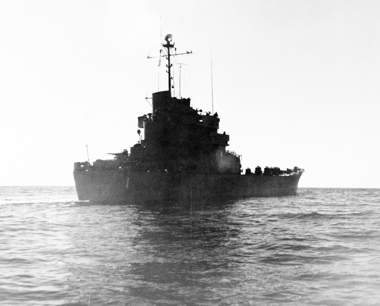 80-G-689757:  USS Carronade (IFS-1), 1955-59.  Carronade was an Inshore Fire Support Ship, built to provide gunfire support to amphibious landings or operations close to shore. Official U.S. Navy Photograph, now in the collections of the National Archives.  (2017/11/01).  Photograph is extremely curved.  