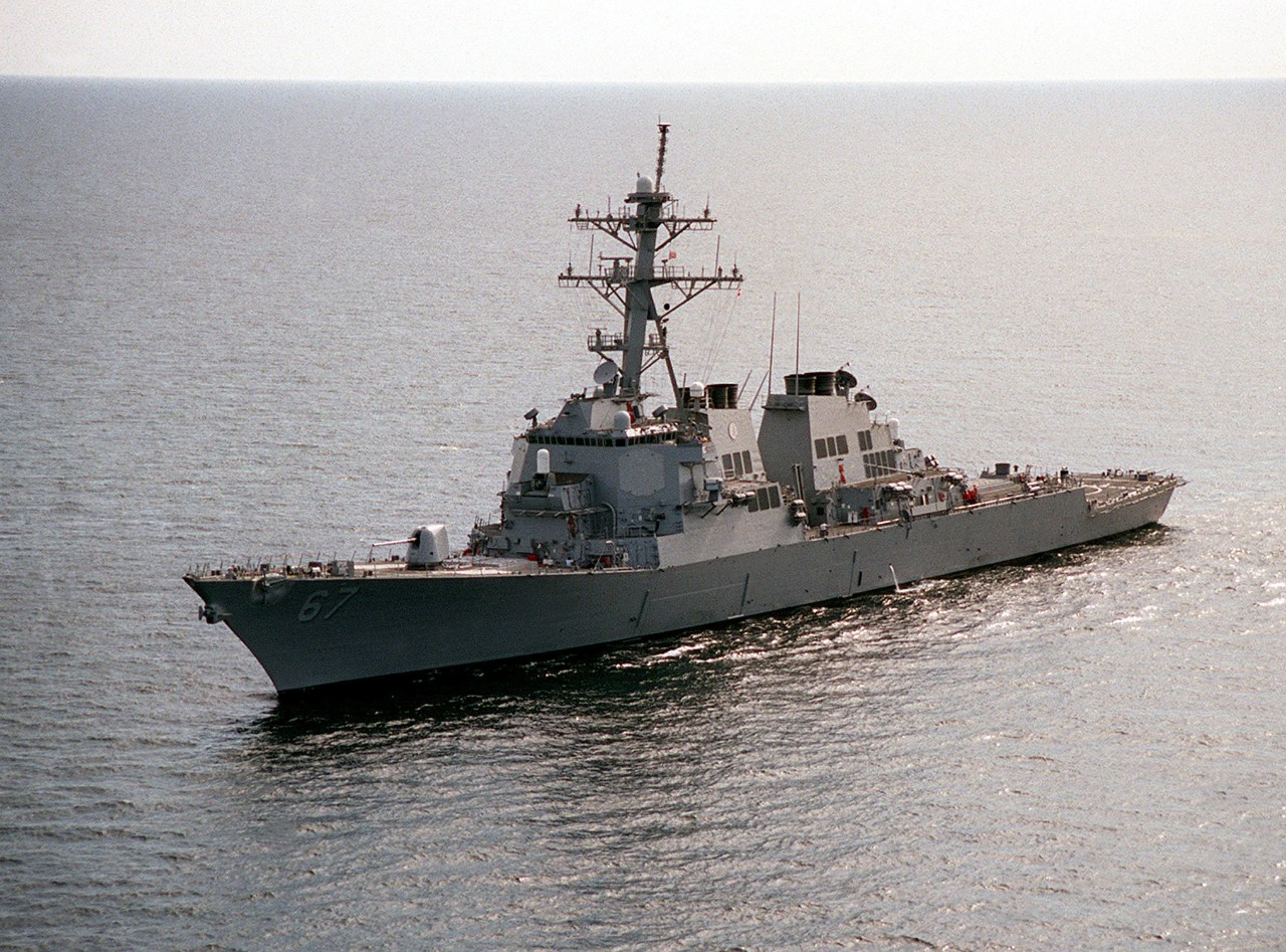330-CFD-DN-SD-01-05108:  USS Cole (DDG-67), 1998.   The Arleigh Burke Class Guided Missile Destroyer, USS Cole (DDG-67), underway in the Persian Gulf in support of the Southwest Asia build-up, March 28, 2008.  Official U.S. Navy photograph, now in the collections of the U.S. National Archives.