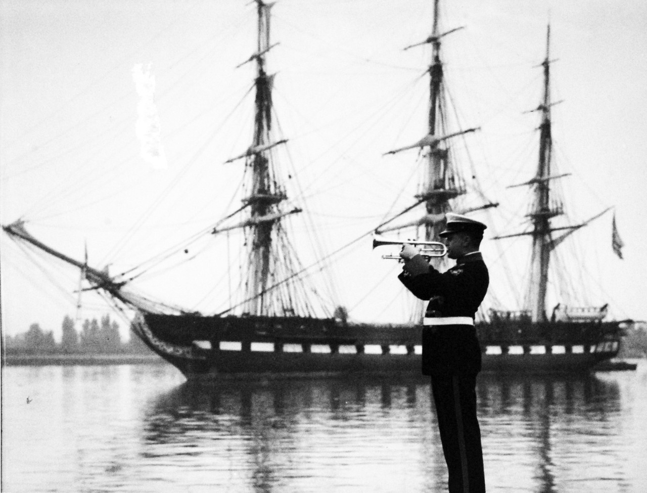 80-G-416313:  USS Constitution, 1931.    Navy Bandsman blowing colors for USS Constitution(IX-21) at Washington, D.C.  Photograph released November 11, 1931.   Official U.S. Navy Photograph, now in the collections of the National Archives.  (2016/10/18).  