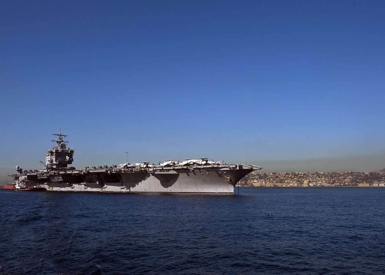 121019-N-FI736-010:   USS Enterprise (CVN-65), 2012.  The aircraft carrier USS Enterprise (CVN 65) is anchored off the coast of Naples, Italy, for its final scheduled port visit before the ships upcoming decommissioning, October 19, 2012. Enterprise is deployed to the U.S. 6th Fleet area of responsibility conducting maritime security operations and theater security cooperation efforts. The U.S. Navy is constantly deployed to preserve peace, protect commerce, and deter aggression through forward presence. Join the conversation on social media using warfighting. Photographed by Mass Communication Specialist 3rd Class Scott Pittman.  Official U.S. Navy Photograph.   