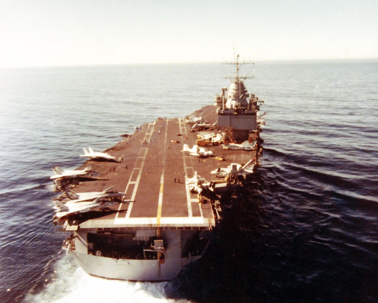 428-GX-K-122195:  USS Enterprise (CVN-65), 1978.   Aerial stern view of the nuclear-powered aircraft carrier while off southern California.  Photographed by PH3 Ted Kappler, December 11, 1978.   Official U.S. Navy Photograph, now in the collections of the National Archives.  (2017/11/29).  