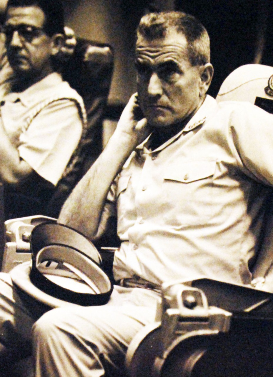 428-GX-USN 1144025:  USS Forrrestal (CVA-59), 1970.   Mediterranean Sea.  Admiral Elmo R. Zumwalt, Jr., prospective Chief of Naval Operations, listens intently during a briefing in one of the pilot ready rooms onboard USS Forrestal (CVA 59).   Photographed by PHC David W. Joy, 1970.    U.S. Navy Photograph, now in the collections of the National Archives. Photographed from small reference card.  Official U.S. Navy Photograph, now in the collections of the National Archives.    (2016/03/29).
