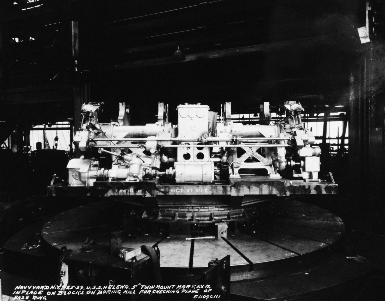 19-LC-23175:   USS Helena (CL 50), June 1939.   The cruiser is at the New York (also known as Brooklyn) Navy Yard, New York City, New York, showing the 5” Twin Mount in place on blocks on boring mill for checking plane of base ring, June 25, 1939.  Official Bureau of Ships Photograph, now in the collections of the National Archives.   (2015/2/18). 