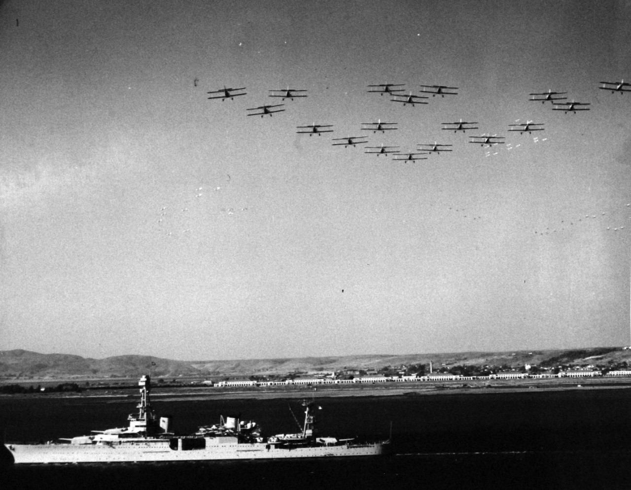 <p>80-CF-393-1: USS Houston (CA 30) leaving San Diego, California, with President Franklin D. Roosevelt and Admiral J.M. Reeves, Commander in Chief, U.S. Fleet on board to review fleet maneuvers at sea, October 2, 1935.&nbsp;</p>
