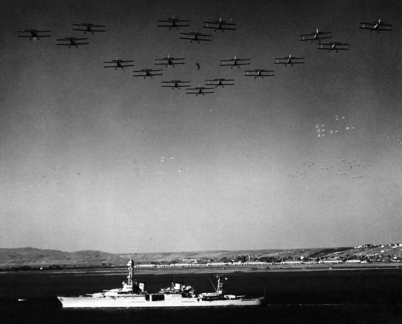 <p>80-CF-393-11: USS Houston (CA 30) leaving San Diego, California, with President Franklin D. Roosevelt and Admiral J.M. Reeves, Commander in Chief, U.S. Fleet on board to review fleet maneuvers at sea, October 2, 1935.&nbsp;</p>
