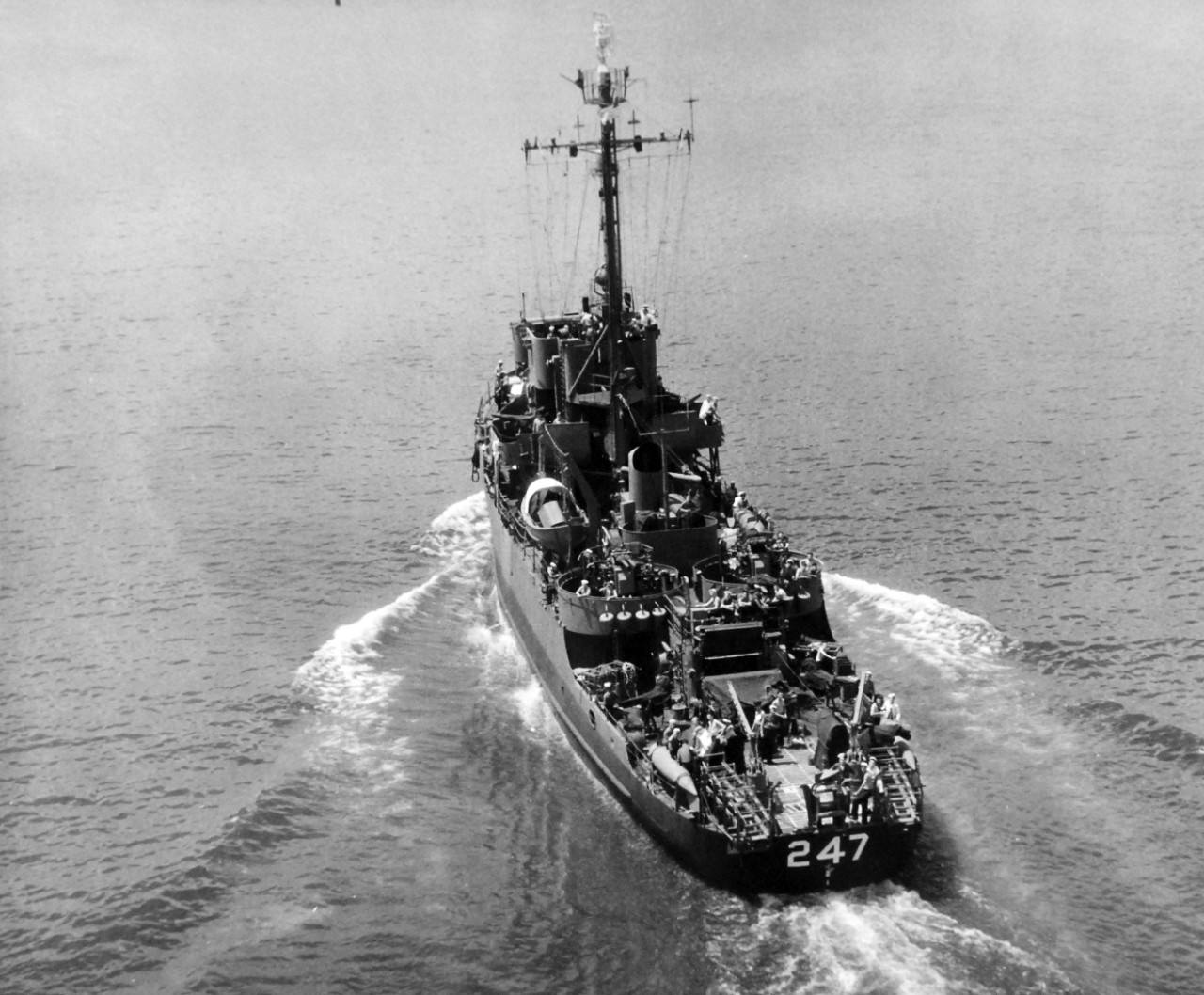 80-G-325050: USS Improve (AM-247),  1945.    Stern view off Norfolk, Virginia, at an altitude of 200’,  June 21, 1945.    Official U.S. Navy Photograph, now in the collections of the National Archives.  (2017/11/01). 