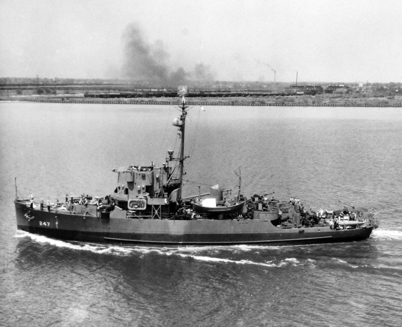 80-G-325051: USS Improve (AM-247), 1945.   Bbroadside off Norfolk, Virginia, at an altitude of 200’, June 21, 1945.    Official U.S. Navy Photograph, now in the collections of the National Archives.  (2017/11/01).   