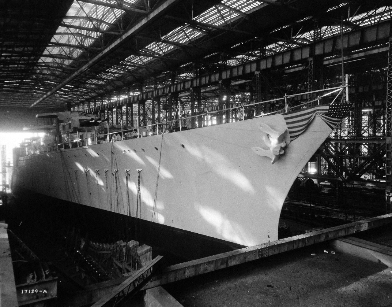 19-LC-61836a:    USS Indianapolis (CA- 35), 1931.    Starboard  view shown during launching at the New York Shipbuilding Corporation, November 7, 1931.   Indianapolis was commissioned on November 15, 1932 and was later sunk during World War II by Japanese submarine I-58 on July 30, 1945.   Official U.S. Navy Photograph, now in the collections of the National Archives.   (2015/2/3).   