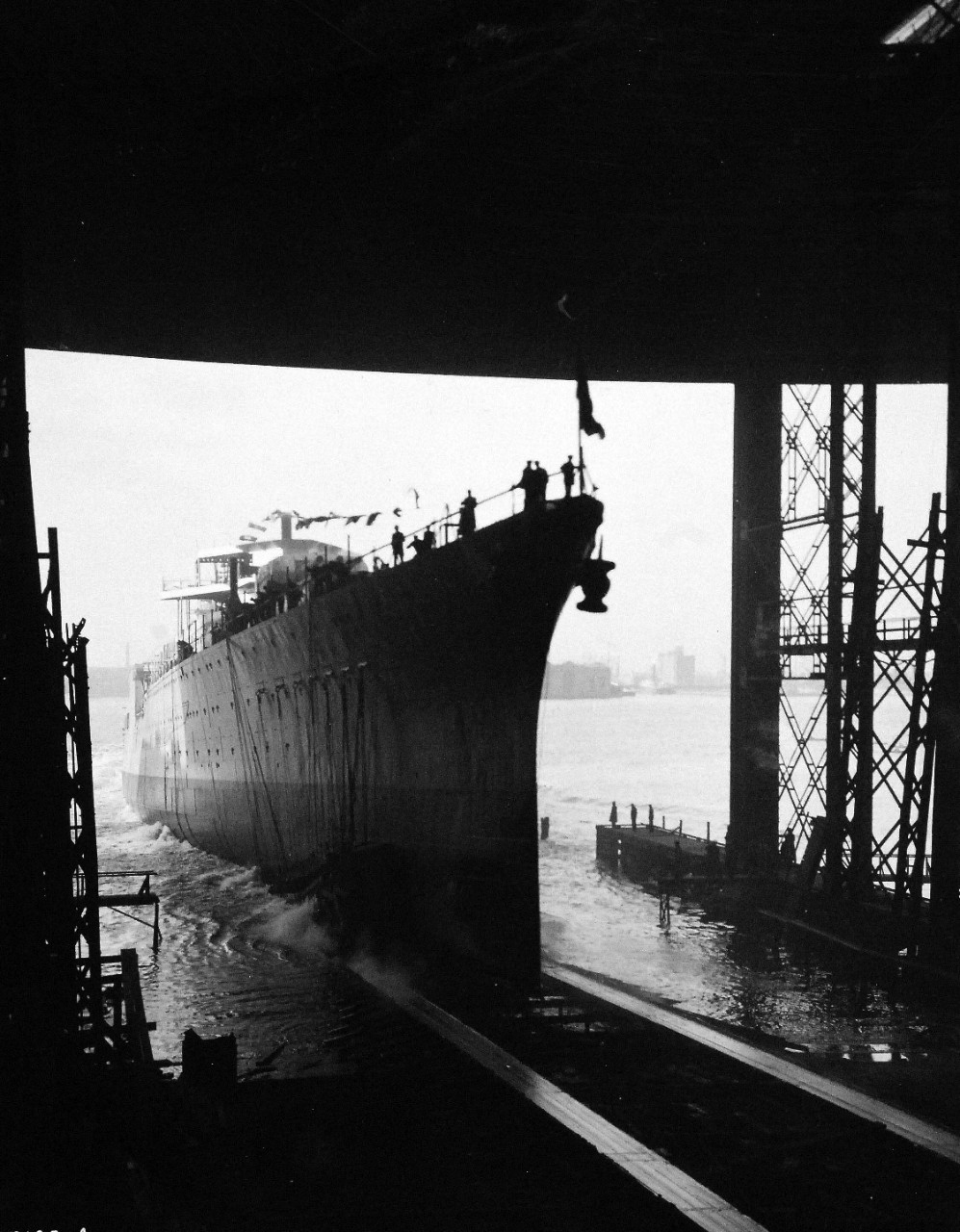 19-LC-61836b:    USS Indianapolis (CA- 35), 1931.    Going “down the ways” during launching at the New York Shipbuilding Corporation, November 7, 1931.   Indianapolis was commissioned on November 15, 1932 and was later sunk during World War II by Japanese submarine I-58 on July 30, 1945.   Official U.S. Navy Photograph, now in the collections of the National Archives.   (2015/2/3).   