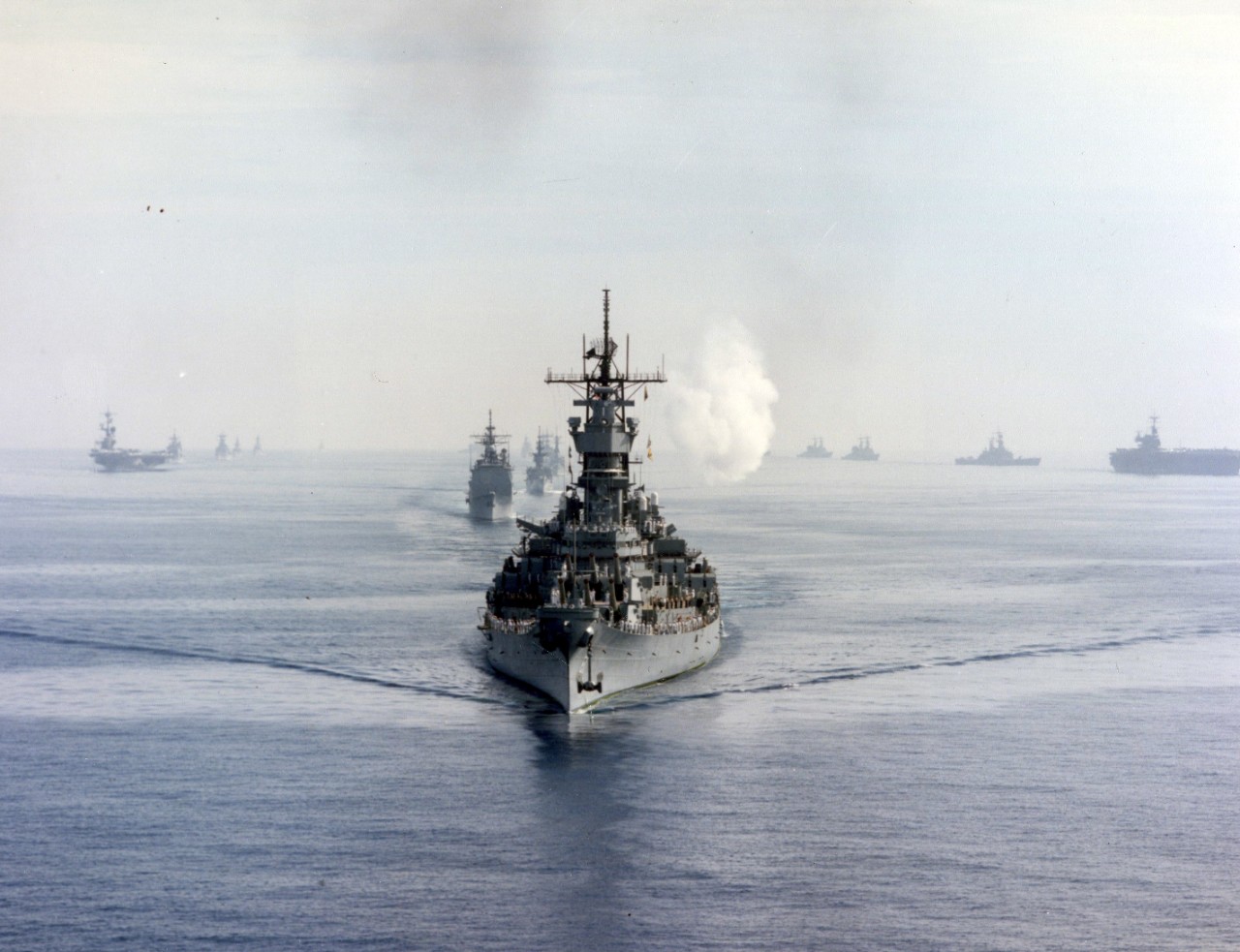 300-CFD- DN-SC-90-11752:  USS Iowa (BB 61), 1987.   USS Iowa leads it battle group into Augusta Bay, Sicily.  The aircraft carrier USS Coral Sea (CV 43) and its battle group are at left.  The aircraft carrier USS Saratoga (CV 60) and its battle group are at right.   Photographed by PH3 Michael Skeens, 17 October 1987.  NHHC Photograph Collection, Navy Subject Files, Ships.