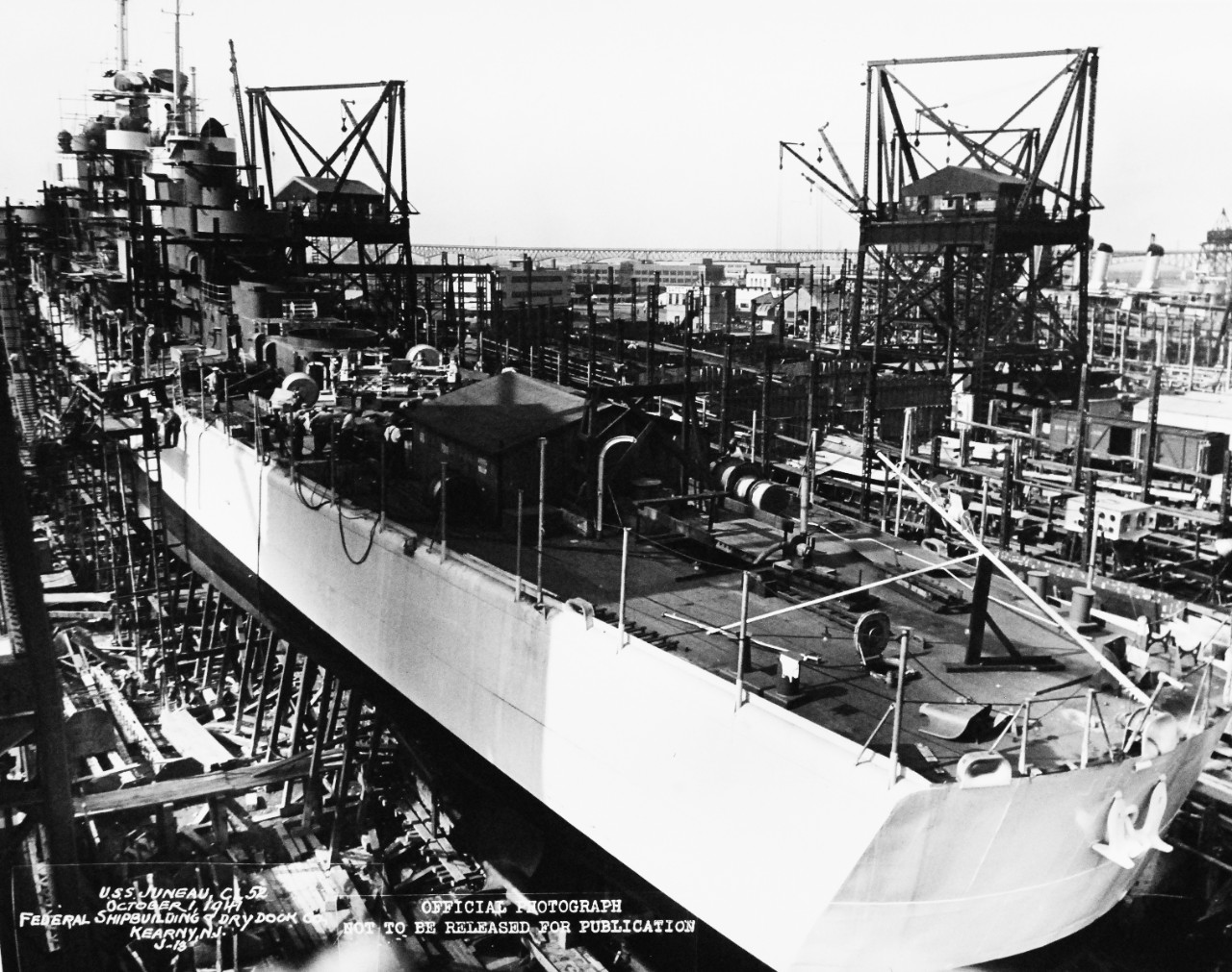 19-LC-28142:  USS Juneau (CL-52),  October 1941.      Light cruiser shown under construction at Federal Shipbuilding and Drydock Company, Kearny, New Jersey, October 1, 1941.  U.S. Bureau of Ships Photograph, now in the collections of the National Archives.  (2015/02/18). 