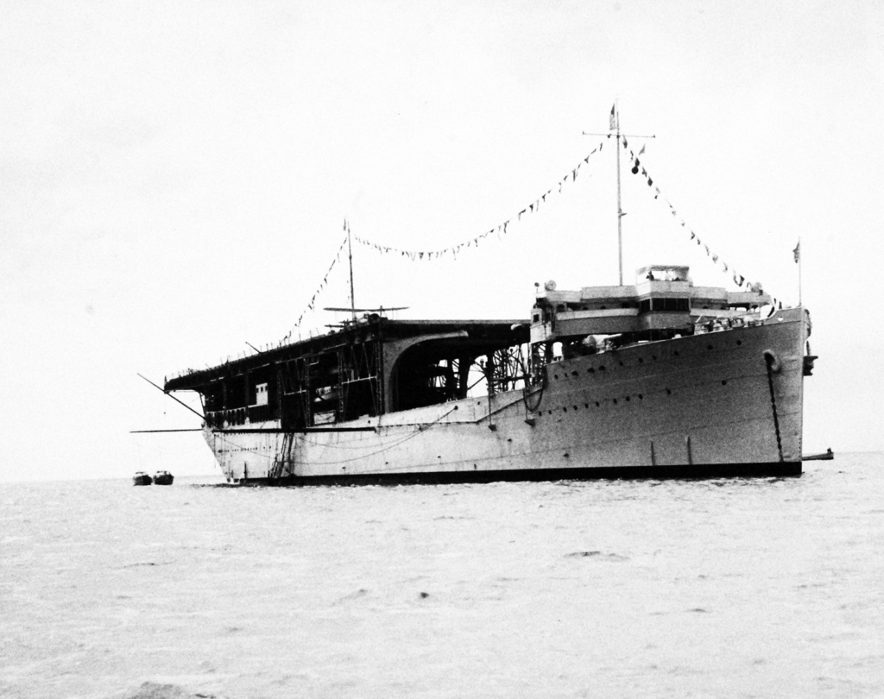 80-G-185870:   USS Langley (AV-3),  1937.   Starboard bow, at French Frigate Shoals, October 27, 1937.  Official U.S. Navy photograph, now in the collections of the National Archives.  (2015/12/22). 